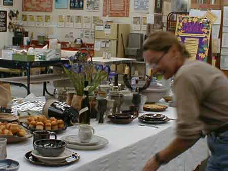 Carola setting the table